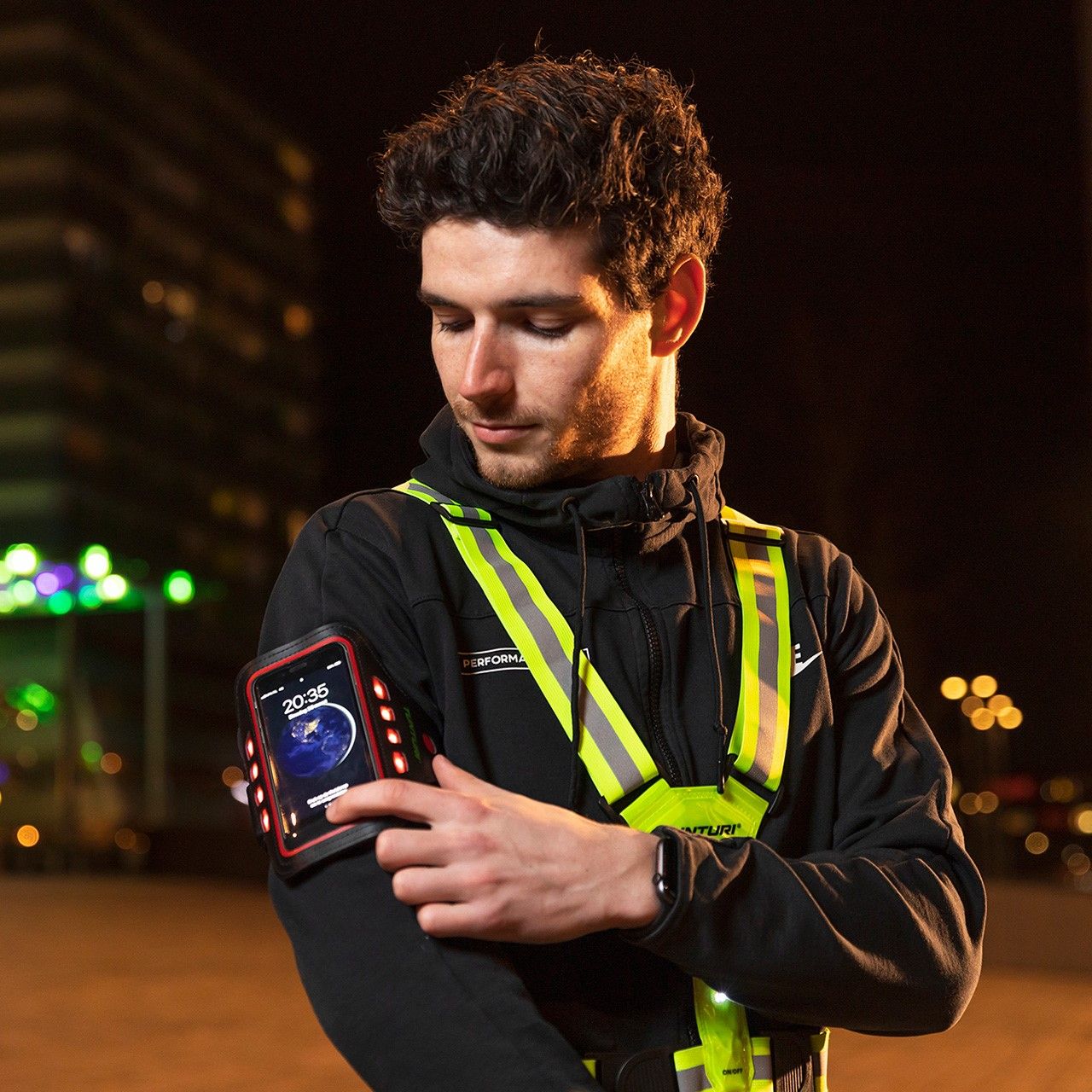 Telefonihoidja käe ümber TUNTURI LED Telephone Sport Armband, kollane